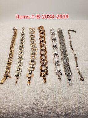 7 Bracelets, items # B-2033-2039,. wt. 187 grams.